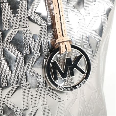 michael kors shiny handbags|Michael Kors silver metallic wallet.